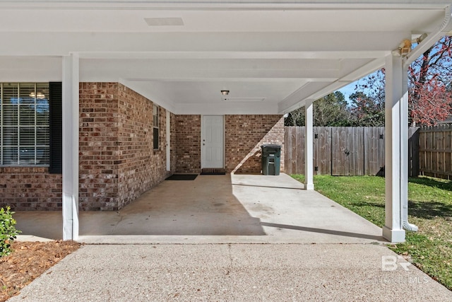 view of patio / terrace featuring a carport