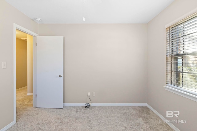 view of carpeted spare room