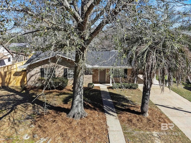 212 Lee St, Fairhope, AL 36532 - view of front of home featuring brick siding and driveway