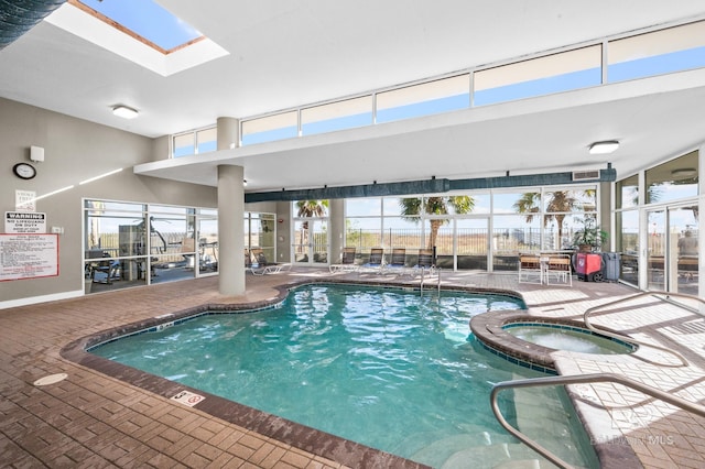 pool featuring a skylight