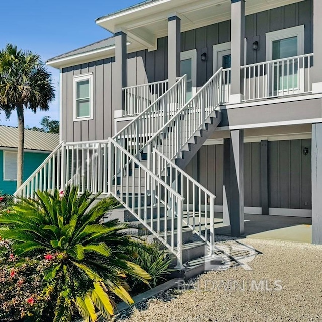 view of exterior entry featuring a porch