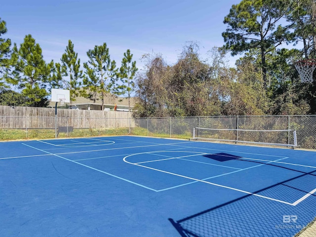 view of sport court featuring basketball hoop