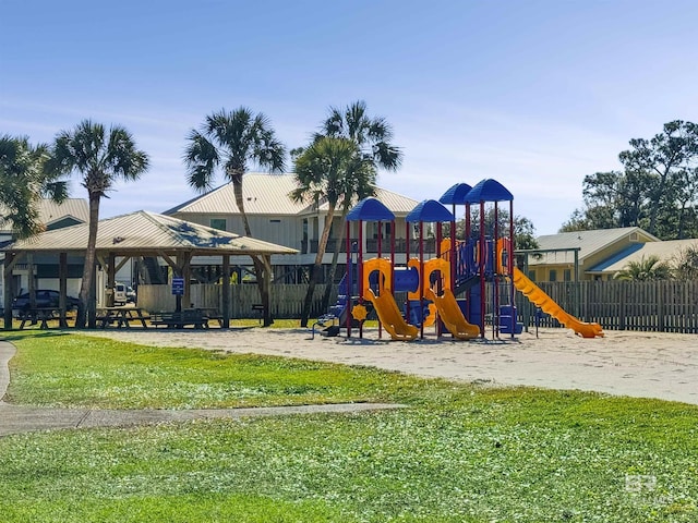 view of jungle gym with a lawn