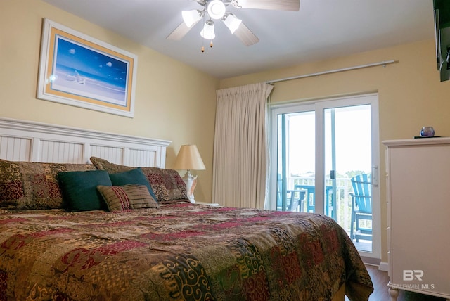 bedroom featuring access to exterior and a ceiling fan