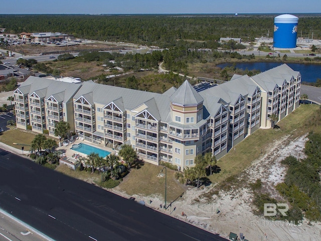drone / aerial view with a water view