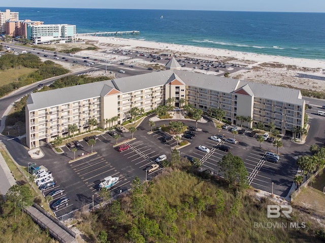 aerial view featuring a water view and a view of the beach
