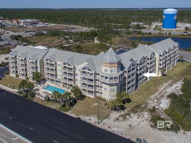 drone / aerial view with a water view
