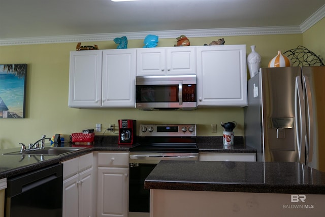 kitchen featuring a sink, appliances with stainless steel finishes, white cabinetry, and crown molding