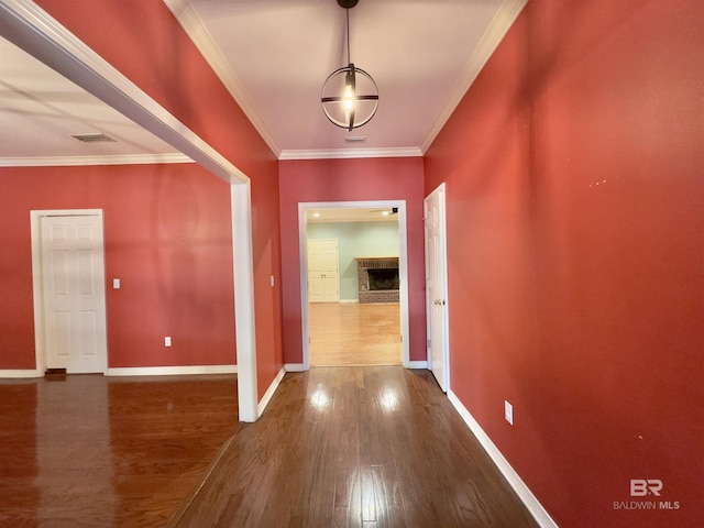 603 Northshore Dr, Bay Minette, AL 36507 - hallway with wood finished floors, baseboards, and ornamental molding