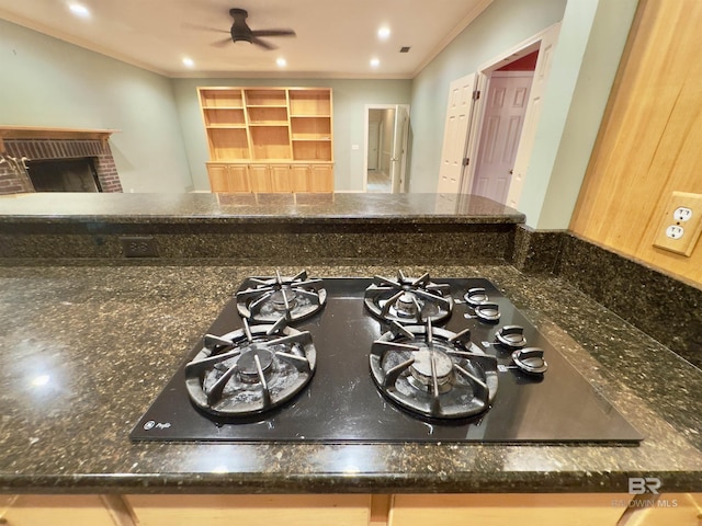 603 Northshore Dr, Bay Minette, AL 36507 - kitchen view of black gas cooktop, ceiling fan, ornamental molding, a fireplace, and recessed lighting