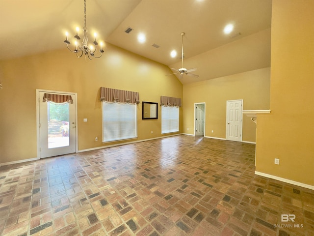 603 Northshore Dr, Bay Minette, AL 36507 - unfurnished room with high vaulted ceiling, a chandelier, a ceiling fan, baseboards, and brick flooring