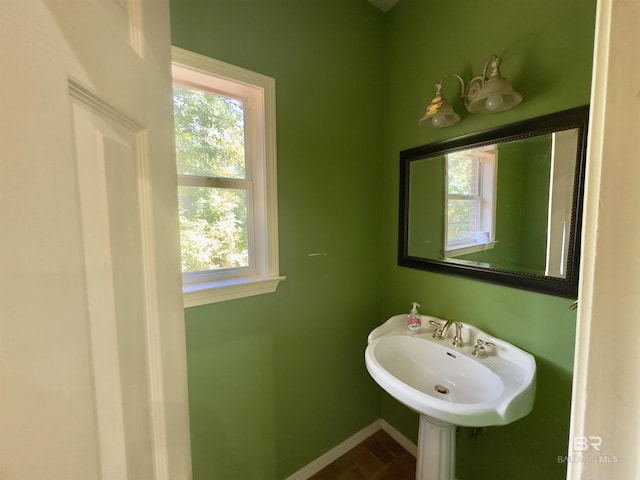 603 Northshore Dr, Bay Minette, AL 36507 - bathroom with baseboards and a sink