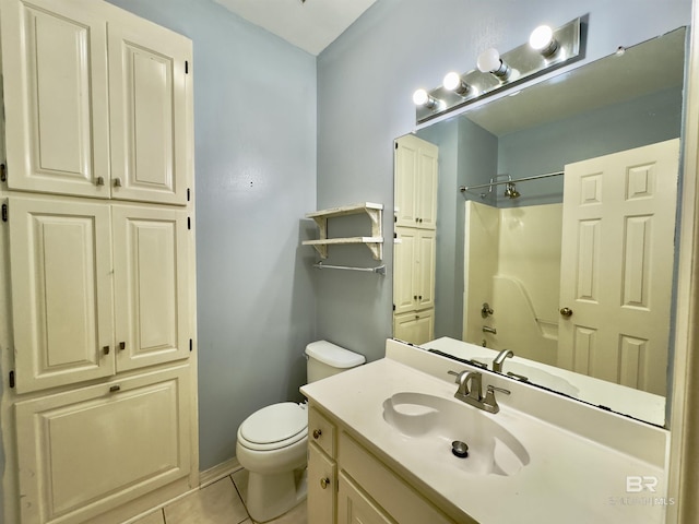 603 Northshore Dr, Bay Minette, AL 36507 - full bathroom featuring toilet, tile patterned flooring, vanity, and baseboards