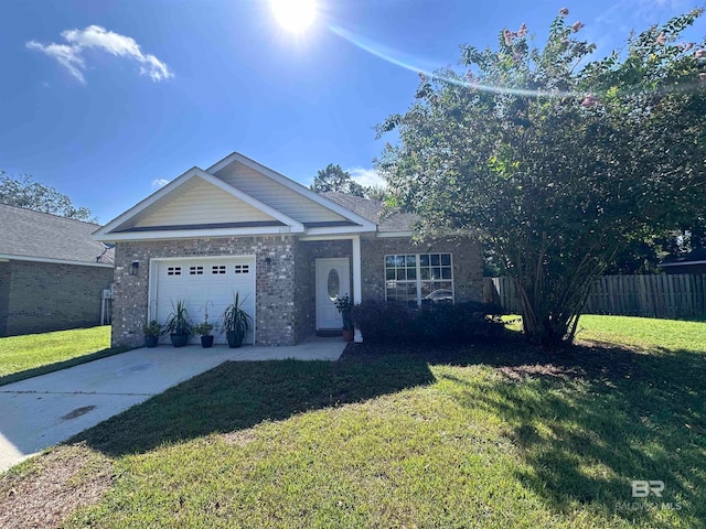 view of front facade with a garage and a front yard