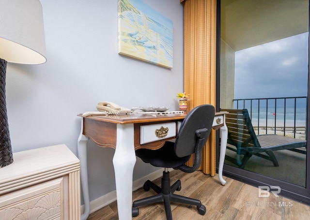 24132 Perdido Beach Blvd Unit 1024, Orange Beach, AL 36561 - office area featuring wood finished floors and baseboards