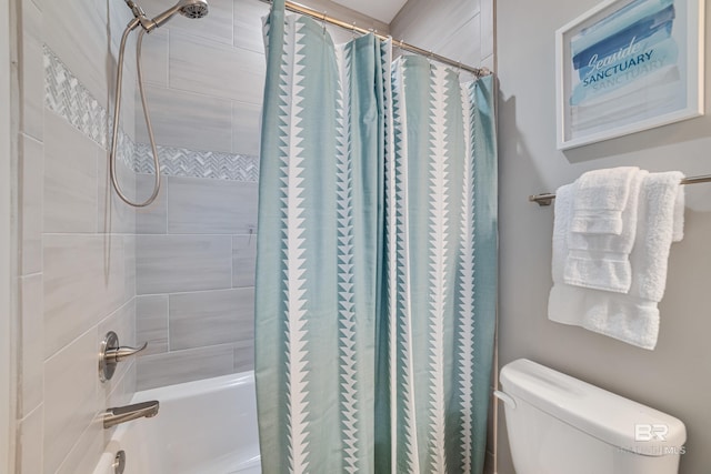 bathroom featuring toilet and shower / tub combo with curtain