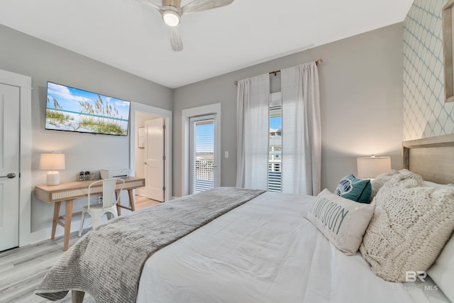 bedroom with a ceiling fan and wood finished floors