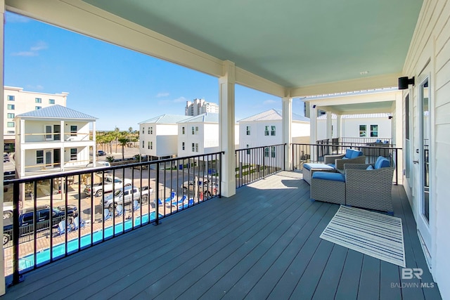 wooden deck with a residential view