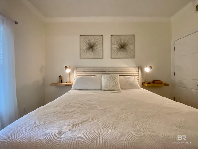 unfurnished bedroom with visible vents and ornamental molding