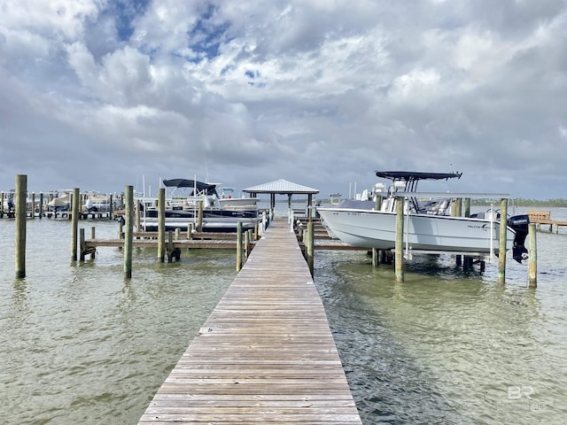 view of dock featuring a water view and boat lift