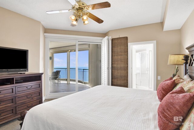13601 Perdido Key Dr Unit W-12A, Perdido Key, FL 32507 - bedroom with a ceiling fan, connected bathroom, a water view, carpet floors, and access to outside