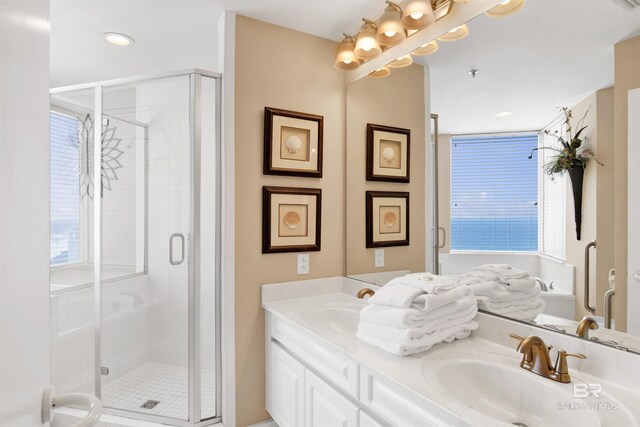 13601 Perdido Key Dr Unit W-12A, Perdido Key, FL 32507 - full bath featuring double vanity, a stall shower, and a sink