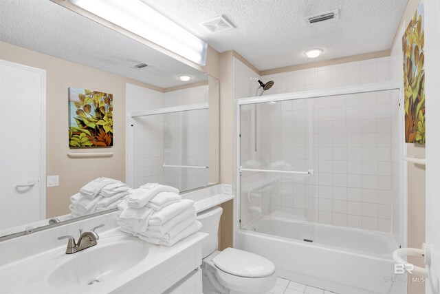 13601 Perdido Key Dr Unit W-12A, Perdido Key, FL 32507 - bathroom featuring a textured ceiling, visible vents, toilet, and shower / washtub combination