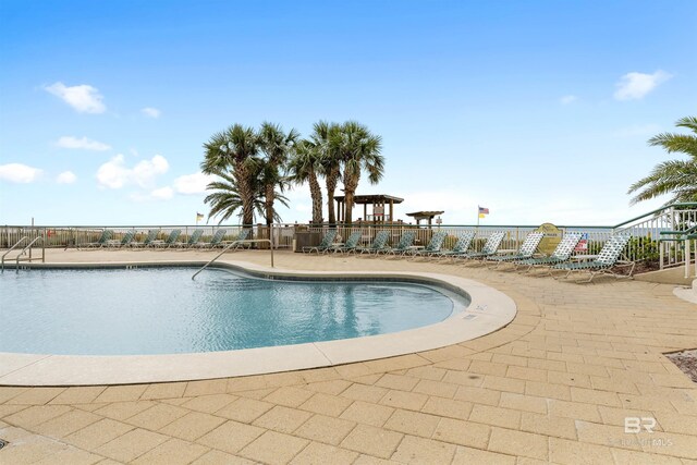 13601 Perdido Key Dr Unit W-12A, Perdido Key, FL 32507 - community pool with fence and a patio area