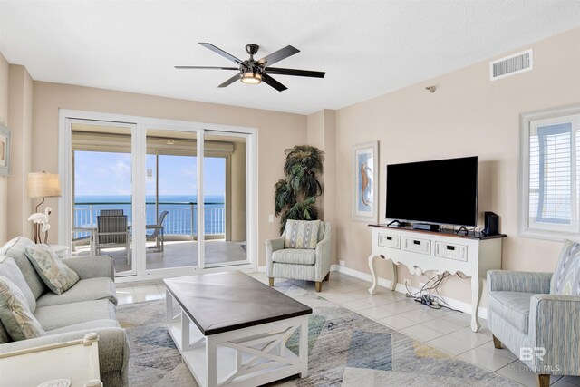 13601 Perdido Key Dr Unit W-12A, Perdido Key, FL 32507 - living area featuring ceiling fan, baseboards, tile patterned floors, and visible vents