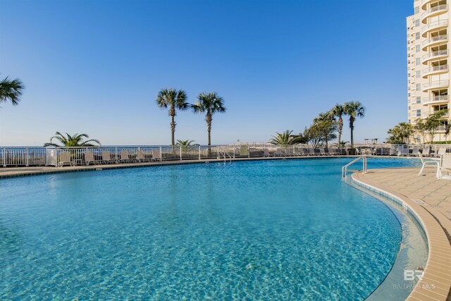 13601 Perdido Key Dr Unit W-12A, Perdido Key, FL 32507 - community pool with fence and a patio area