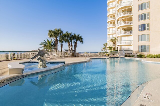 13601 Perdido Key Dr Unit W-12A, Perdido Key, FL 32507 - pool featuring a hot tub and fence