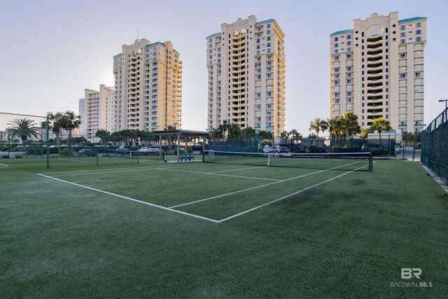 13601 Perdido Key Dr Unit W-12A, Perdido Key, FL 32507 - view of tennis court featuring a city view and fence