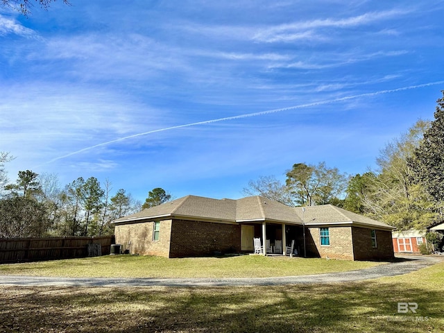 exterior space featuring a lawn