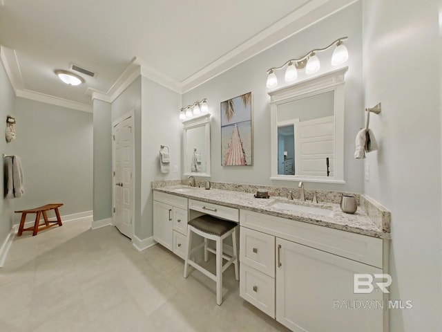 bathroom with vanity and ornamental molding