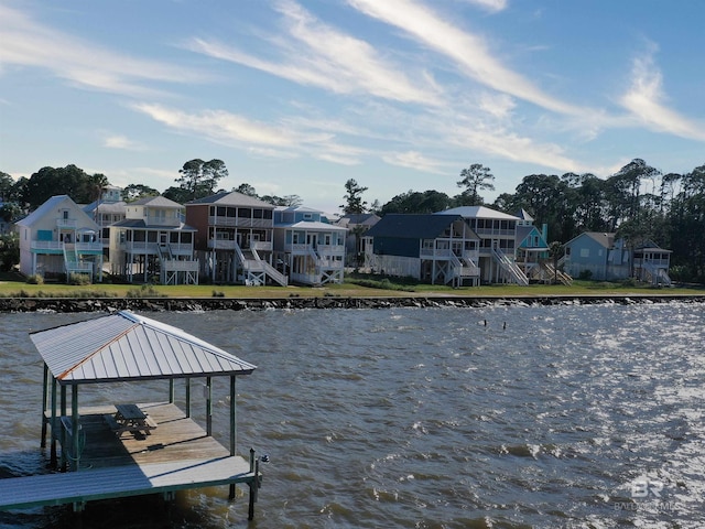 dock area with a water view