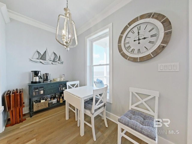 dining space with an inviting chandelier and light wood-type flooring