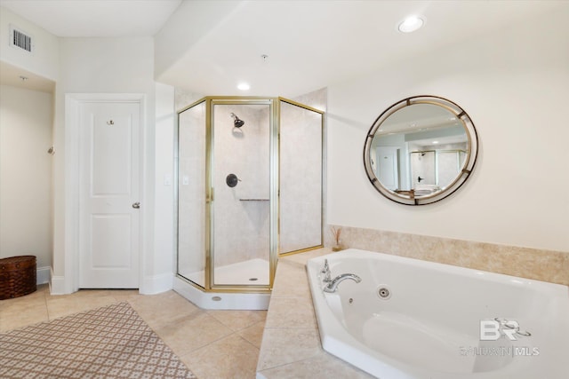 bathroom featuring plus walk in shower and tile patterned floors