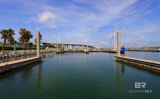 view of dock with a water view