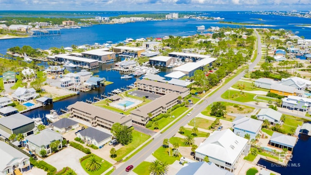 drone / aerial view with a water view