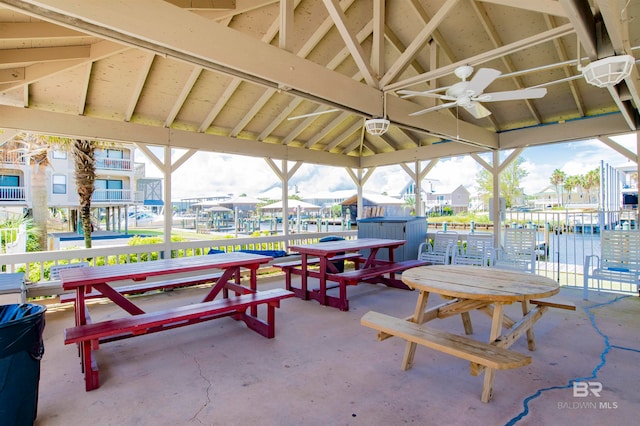 view of patio with ceiling fan and a gazebo