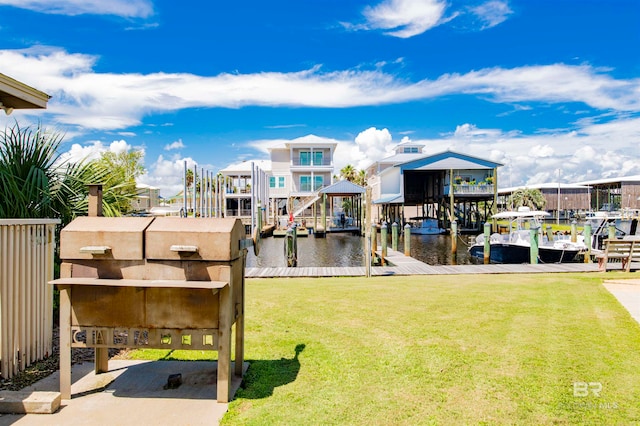 exterior space featuring a dock and a water view