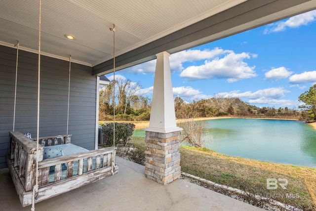 view of patio / terrace with a water view