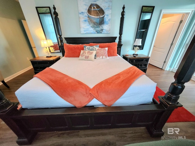 bedroom featuring hardwood / wood-style flooring