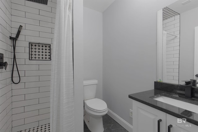 bathroom with vanity, toilet, and a shower with shower curtain