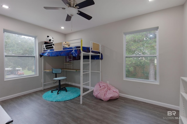 bedroom with baseboards, wood finished floors, recessed lighting, and ceiling fan