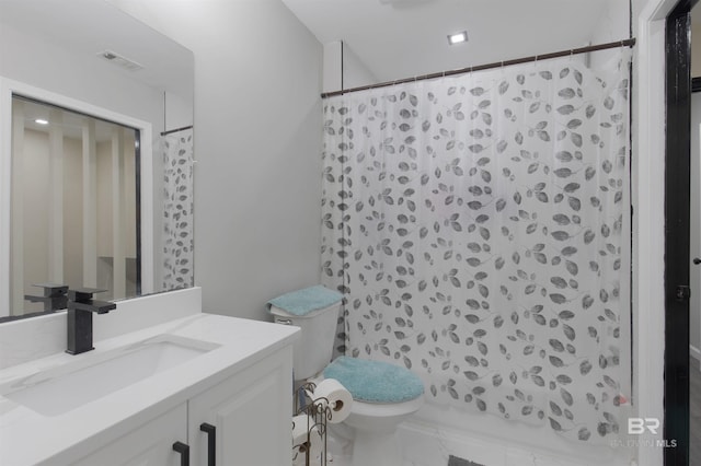 full bath with toilet, vanity, shower / tub combo with curtain, and visible vents