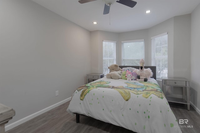 bedroom featuring dark hardwood / wood-style floors and ceiling fan