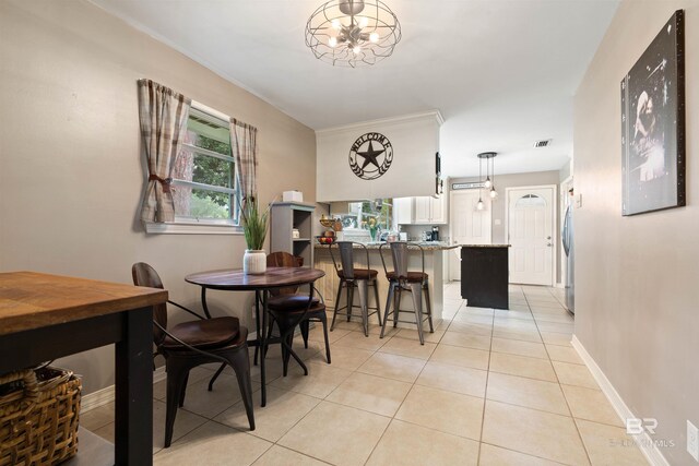 tiled dining room with ornamental molding