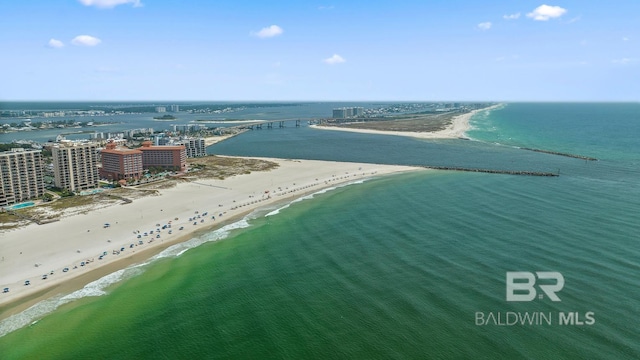 bird's eye view with a water view and a view of the beach