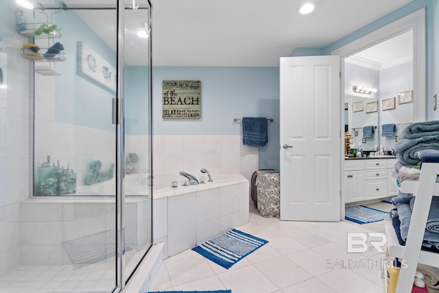 bathroom with vanity, shower with separate bathtub, tile floors, and crown molding